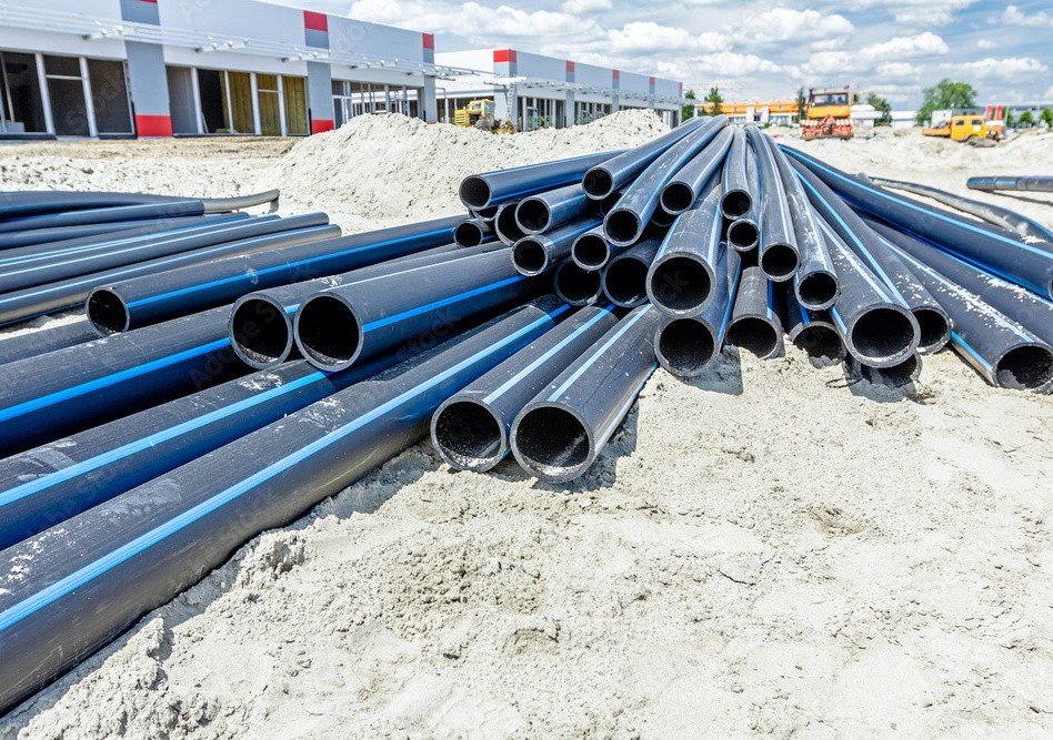 Close-up of waterworks HDPE pipe and hydrant fitting